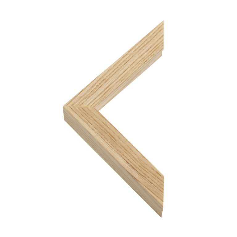 Coin d'un cadre en bois clair pour tirage photo